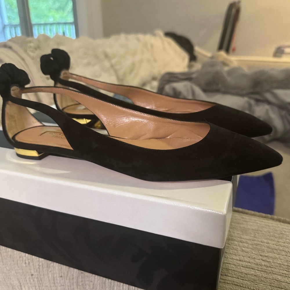 Aquazzura Deneuve suede point toe Black flats as seen on Meghan Markle.